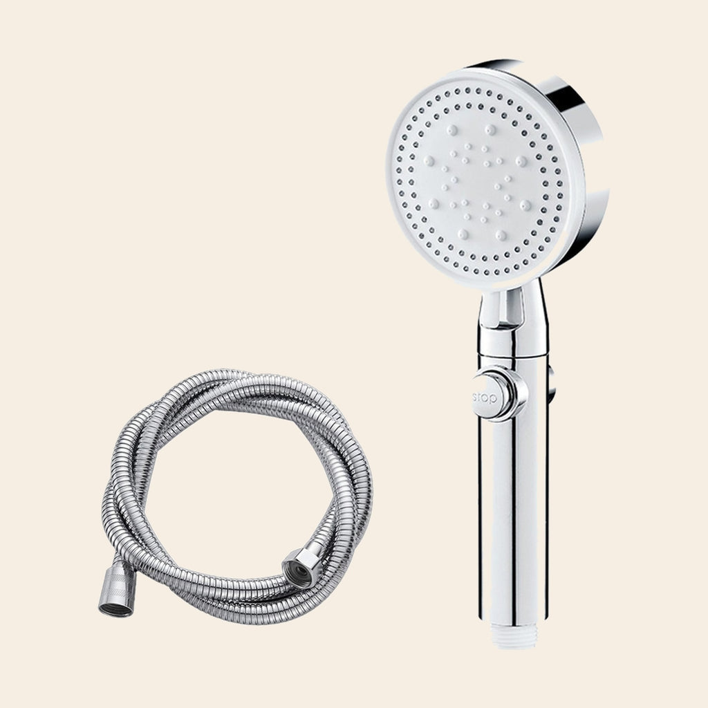 The silver shower head and its 1.5 m hose laid out together, as they arrive