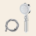The silver shower head and its 1.5 m hose laid out together, as they arrive