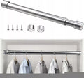 The polished silver telescopic rod with its flange sockets and fixing screws, above a view of the rail installed in a light-coloured wardrobe holding shirts on hangers.
