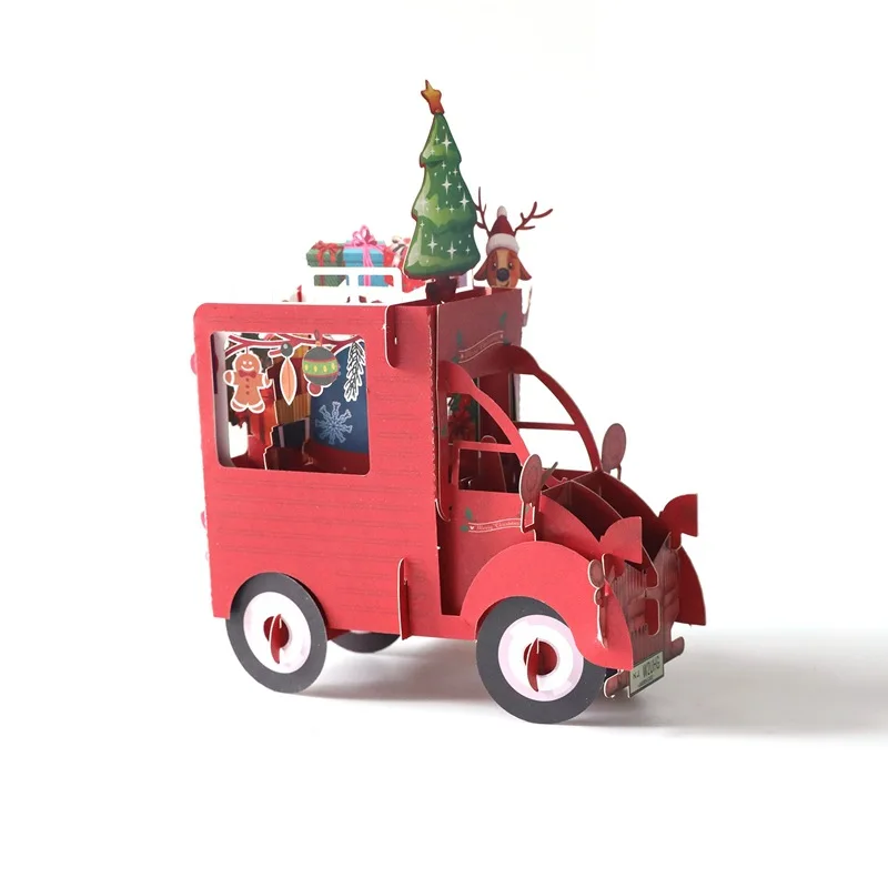 3D pop-up Christmas card in a red Christmas van design, standing open — sold as a pack of 5
