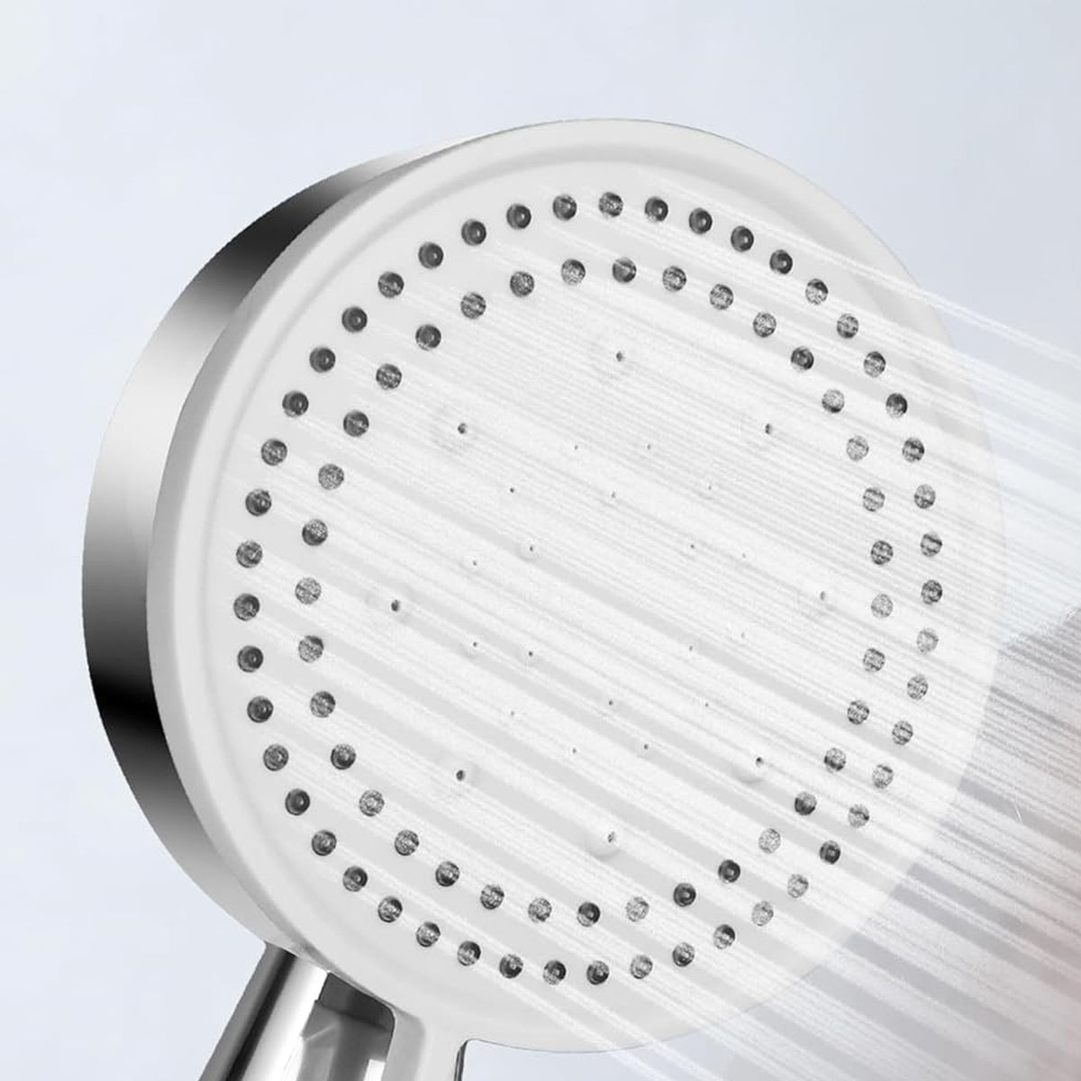 The silver handheld shower head with water running from its spray face