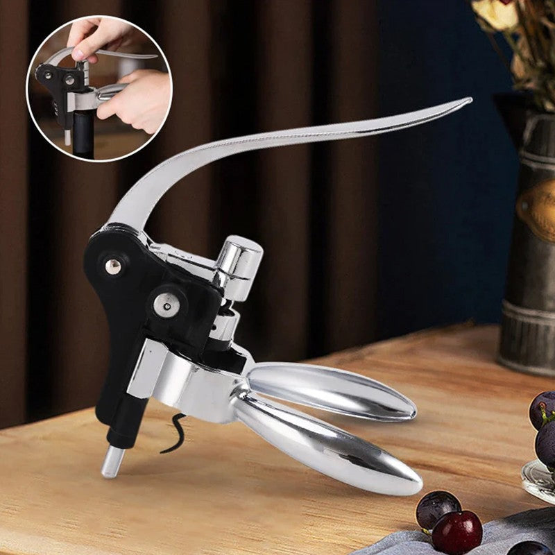 Silver and black lever corkscrew standing on a wooden table, with an inset showing it gripped over a wine bottle