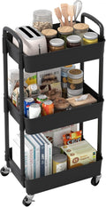 Black three-tier plastic rolling storage trolley on four wheels, filled with kitchen jars and packets.