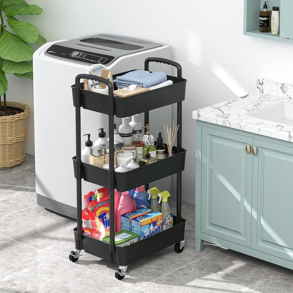 The black trolley in a bathroom beside a washing machine, holding toiletries and cleaning bottles.